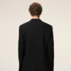 Veste droite en laine vierge noire à simple boutonnage