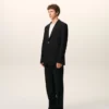 Veste droite en laine vierge noire à simple boutonnage
