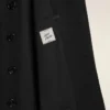 Veste droite en laine vierge noire à simple boutonnage