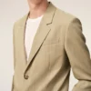 Veste droite à simple boutonnage en laine vierge beige